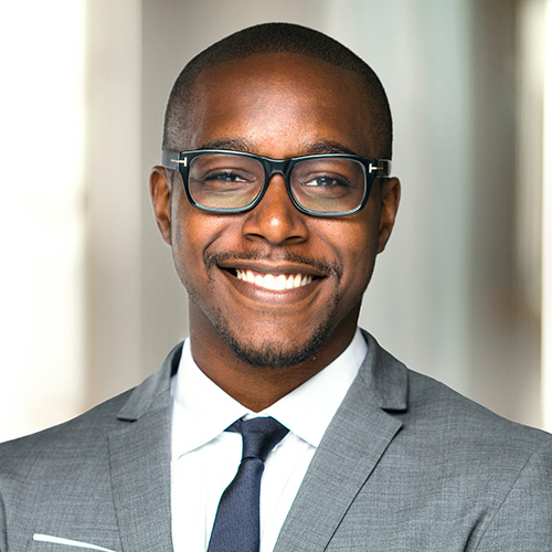 Man in suit smiling